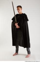 Man Adult Athletic White Fighting with sword Standing poses Coat